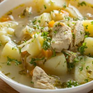 Chicken soup with potatoes and noodles