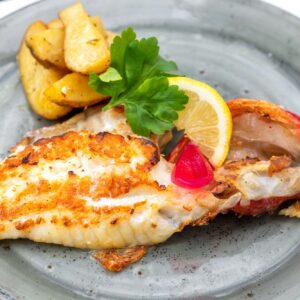 plate of grilled fish fillet