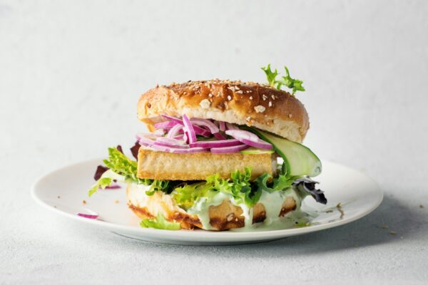 Tofu burger with vegetables on plate